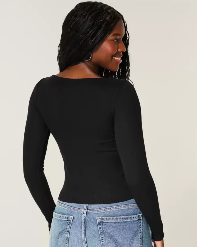 Top a maniche lunghe con scollo a V