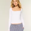 Top a maniche lunghe con scollo quadrato