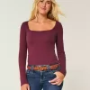 Top a maniche lunghe con scollo quadrato