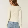 Top a maniche lunghe con scollo quadrato