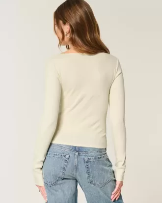 Top a maniche lunghe con scollo quadrato