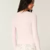 Top a maniche lunghe con scollo quadrato