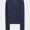 Top a maniche lunghe con scollo quadrato