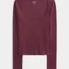 Top a maniche lunghe con scollo quadrato