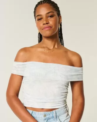 Top a spalle scoperte con scollo a V e scollo a V in rete