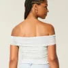 Top a spalle scoperte con scollo a V e scollo a V in rete