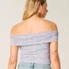 Top a spalle scoperte con scollo a V e scollo a V in rete