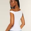 Top asimmetrico con spalle scoperte