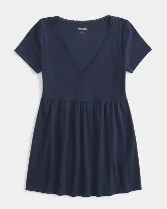 Top babydoll a maniche corte con bordi in pizzo
