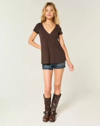 Top babydoll a maniche corte con bordi in pizzo