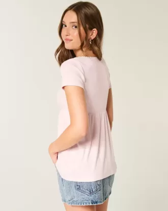 Top babydoll a maniche corte con bordi in pizzo