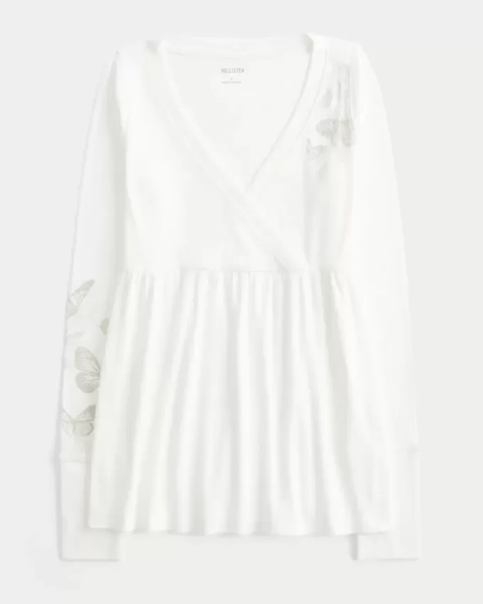 Top babydoll a maniche lunghe con motivo a farfalla