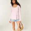 Top babydoll a maniche lunghe con motivo floreale