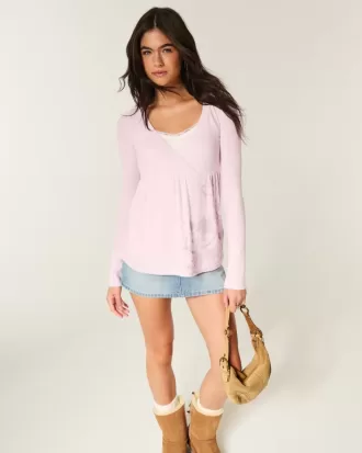 Top babydoll a maniche lunghe con motivo floreale