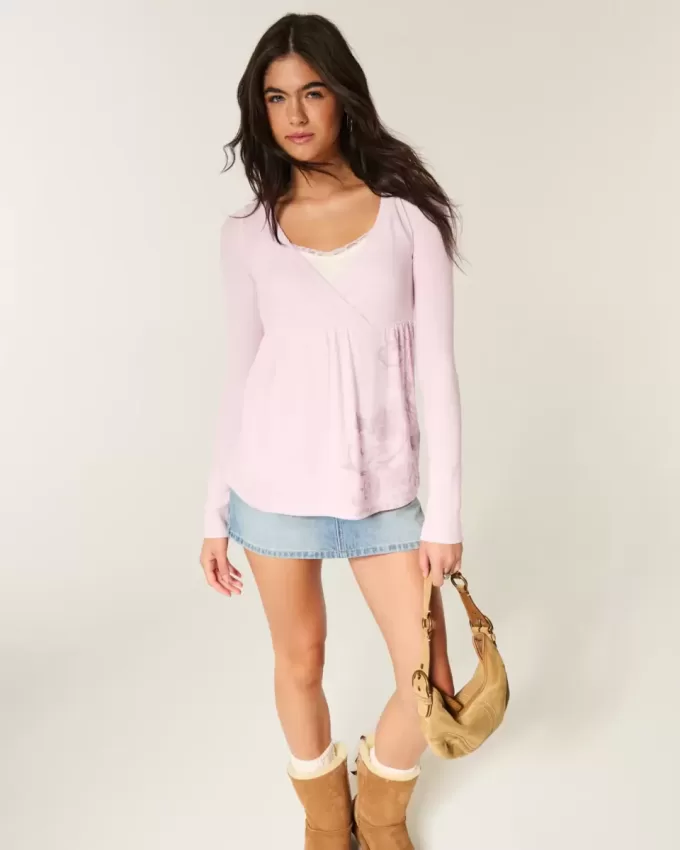 Top babydoll a maniche lunghe con motivo floreale