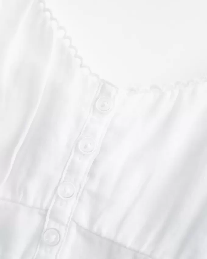 Top babydoll con bottoni