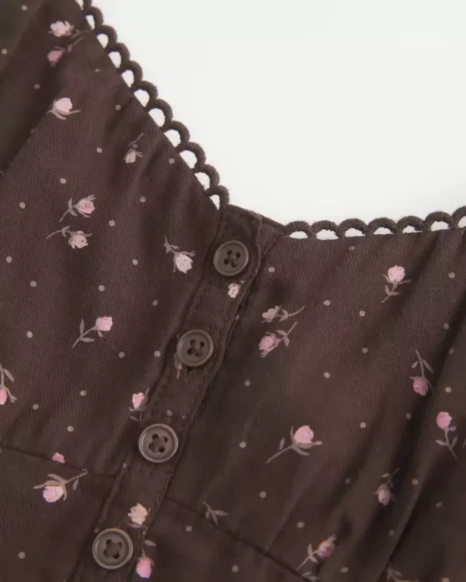 Top babydoll con bottoni