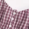 Top babydoll con bottoni