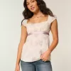Top babydoll con lacci in raso