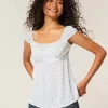 Top babydoll con lacci in raso