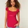 Top babydoll con lacci in raso