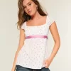 Top babydoll con lacci in raso