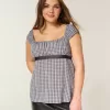 Top babydoll con lacci in raso