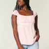 Top babydoll con lacci in raso