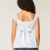 Top babydoll con lacci in raso