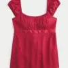 Top babydoll con lacci in raso