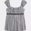 Top babydoll con lacci in raso