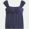 Top babydoll con lacci in raso