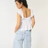 Top babydoll con lacci sul davanti