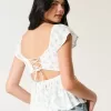 Top babydoll con maniche a sbuffo