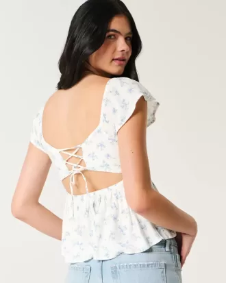 Top babydoll con maniche a sbuffo