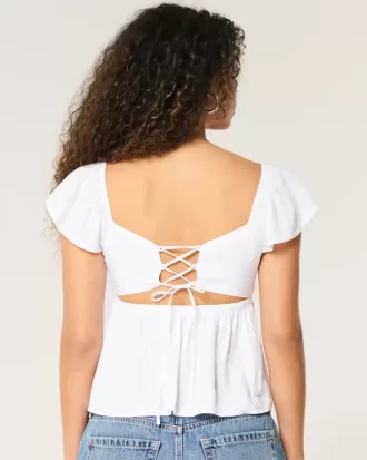 Top babydoll con maniche a sbuffo