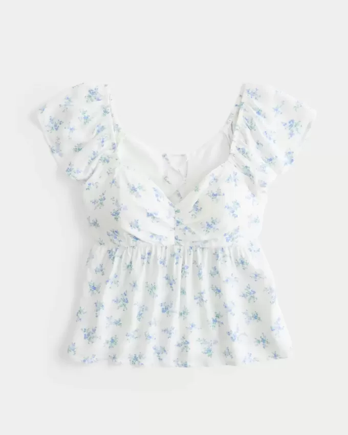 Top babydoll con maniche a sbuffo