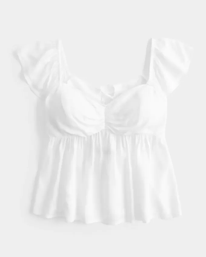 Top babydoll con maniche a sbuffo