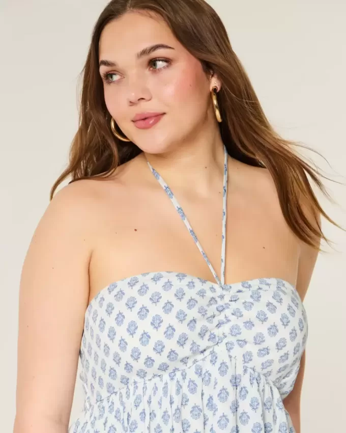 Top babydoll con scollo all’americana a strati