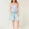 Top babydoll con scollo all’americana a strati