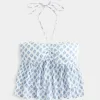 Top babydoll con scollo all’americana a strati