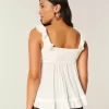 Top babydoll con volant facile Top babydoll con volant facile