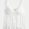 Top babydoll con volant facile Top babydoll con volant facile