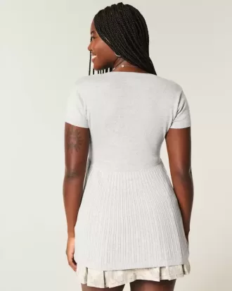 Top babydoll Henley a maniche corte