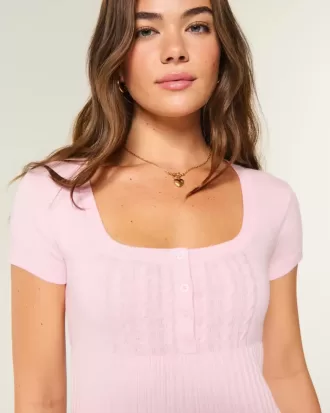 Top babydoll Henley a maniche corte