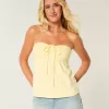 Top babydoll senza spalline con spalline strette