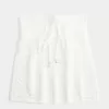 Top babydoll senza spalline in stile uncinetto