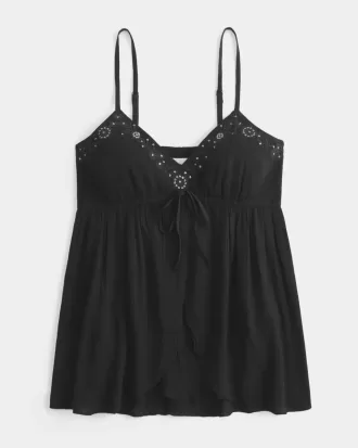 Top babydoll svolazzante e brillante increspato