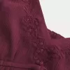 Top babydoll svolazzante e brillante increspato