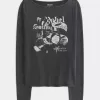 Top con scollo a V e grafica Brooklyn Music